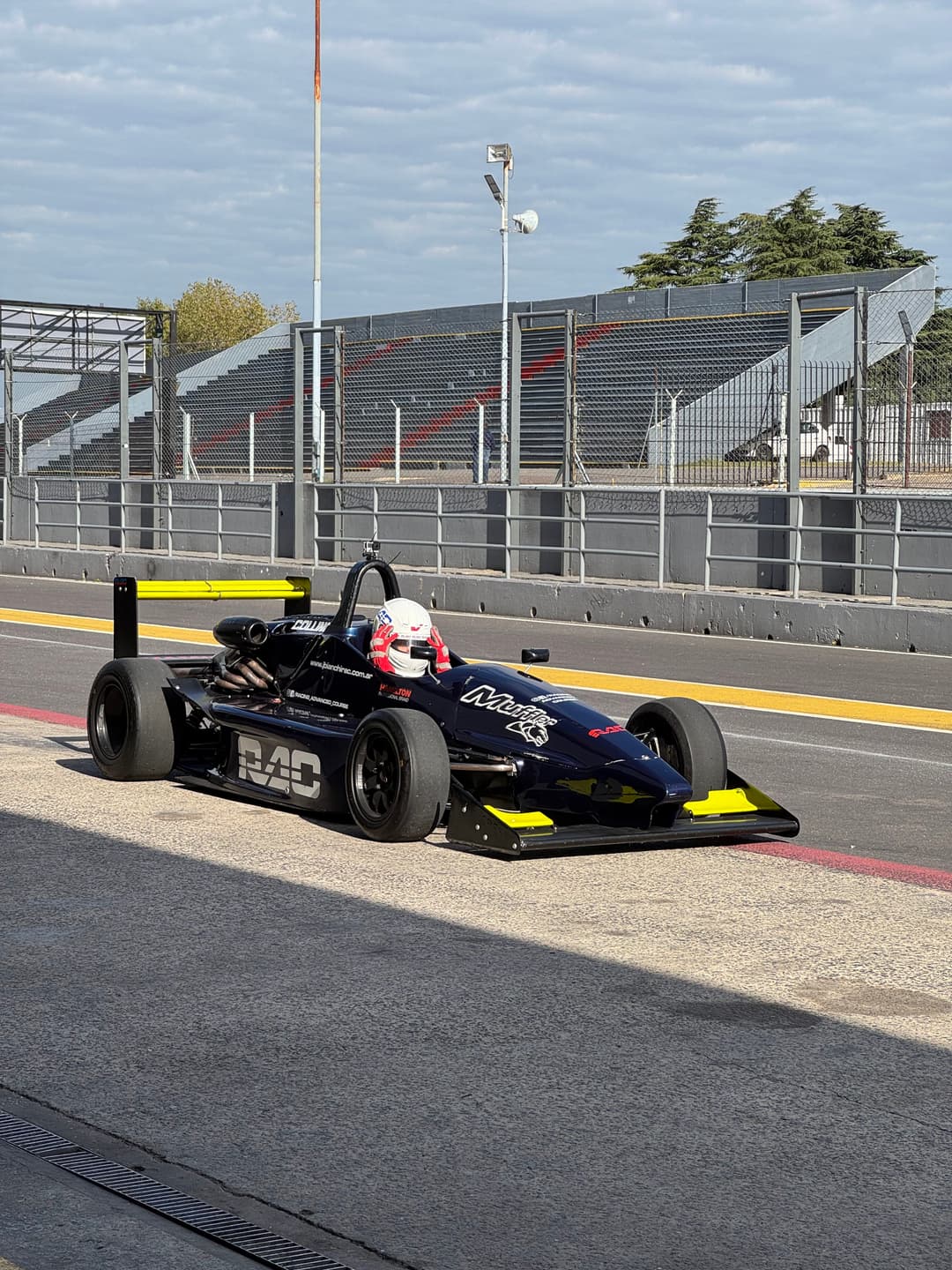 Formula 4 car on track at Juan y Oscar Galvez circuit